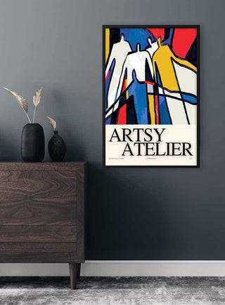 Shadow - Artsy Atelier Plakat with abstract colorful figures, framed on a dark wall above a modern wooden dresser.