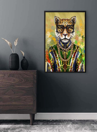 Framed Leopard King Plakat featuring a leopard in regal attire and glasses, hung on a gray wall above a dresser.