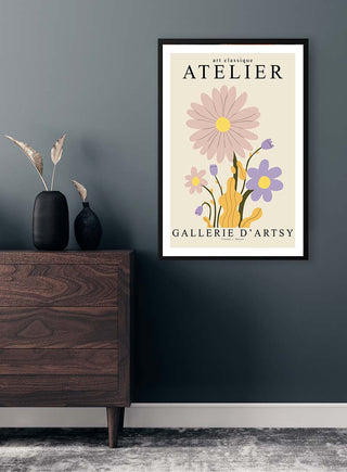 Framed Flower Exhibition - Vincent V Plakat on wall above wooden dresser with vase and dried flowers.