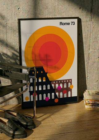 Rome 73 by Bo Lundberg in a black frame leaning against a concrete wall by a steel chair