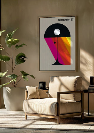 Stockholm 67 by Bo Lundberg framed above a beige armchair beside a potted plant