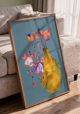 Princess earring by Marjorie Salvagni in a walnut frame leaning against a grey sofa