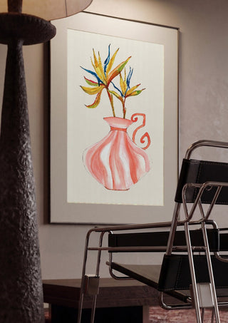 Bird of paradise by Marjorie Salvagni framed in a dim room beside a tubular steel chair