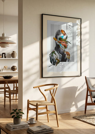 Spring landscape by Rocio Montoya in a black frame in a bright dining room with wooden chairs