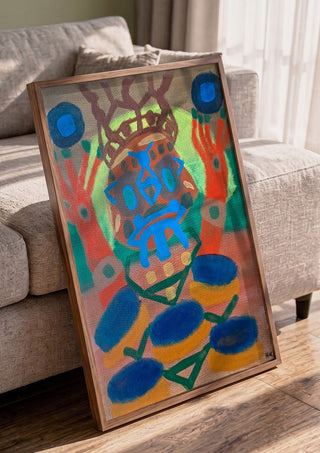uppstigning by Hampus Nerén in a walnut frame leaning against a grey sofa