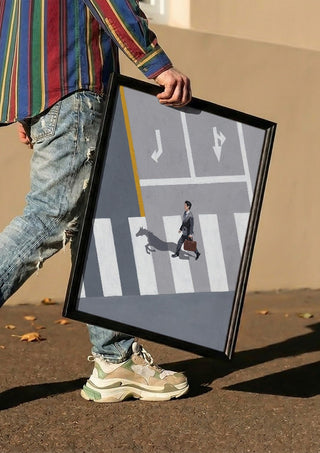Dark horse by Jaron Su carried in a black frame along a sunny street