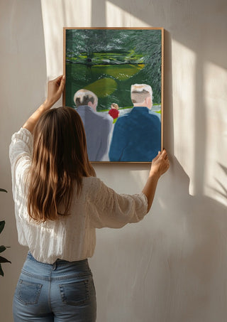 Koselig by Jaron Su being hung on a sunlit wall