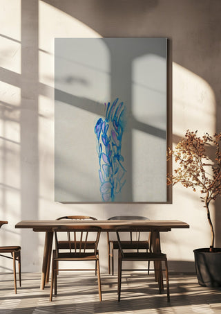 Blue ChrysAlice by Alice Ruja hanging above a wooden dining table in warm sunlight