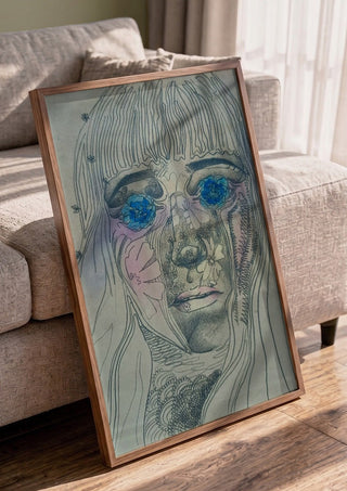 Awe by Alice Ruja in a walnut frame leaning against a grey sofa