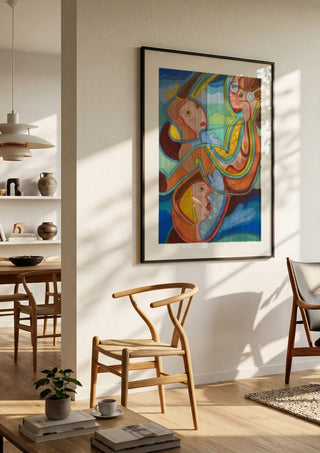 Three pilots by Gerard Ceulemans in a black frame in a bright dining room with wooden chairs