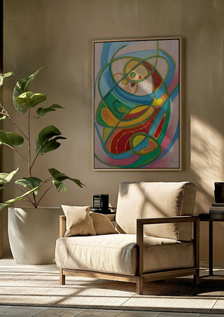Embrace by Gerard Ceulemans framed above a beige armchair beside a potted plant