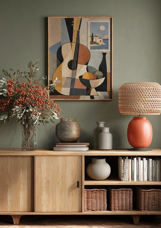 Bohemian String Instrument Still Life – Earthy Tones & Coastal Scene by TimlessArtworks above a wooden sideboard on a sage green wall
