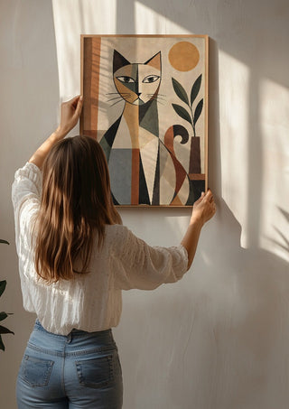 Bohemian Geometric Cat – Terracotta, Botanical & Earthy Forms by TimlessArtworks being hung on a sunlit wall