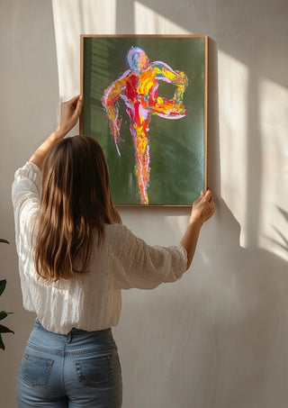 Figure in Motion by René J being hung on a sunlit wall