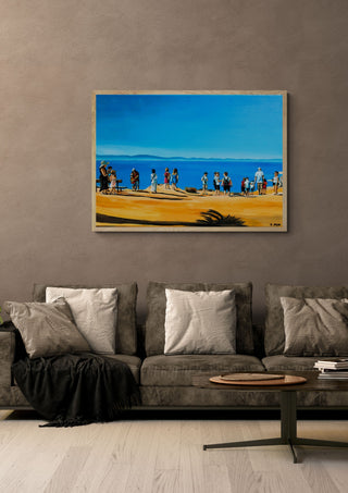 Above Rhodes Town by Nella Hajdu framed in light wood above a grey sofa with cushions