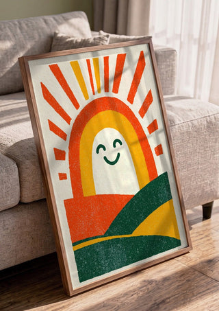 Sunrise Arch by Decker Studios in a walnut frame leaning against a grey sofa