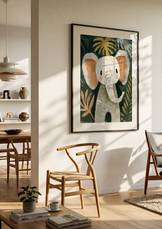 Jungle Elephant by Decker Studios in a black frame in a bright dining room with wooden chairs