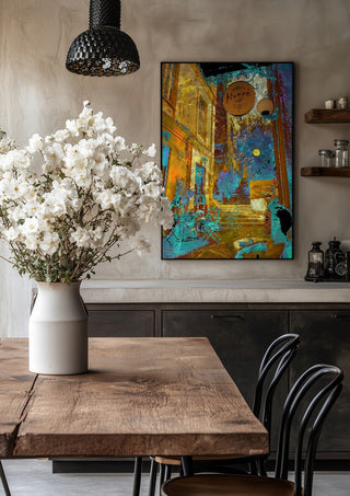 Mikro Cafe by Pelecan Schneider in a black frame above a rustic table with white flowers
