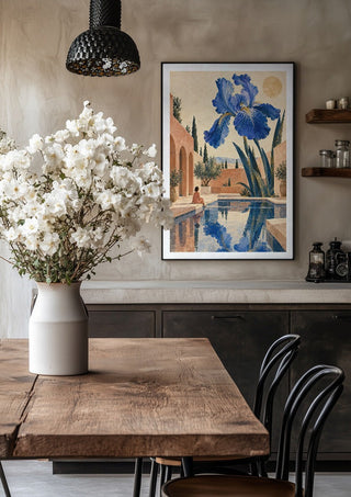 The Blue Garden by Matthews Gallerie in a black frame above a rustic table with white flowers