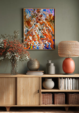 Ember Current by Da Winters above a wooden sideboard on a sage green wall
