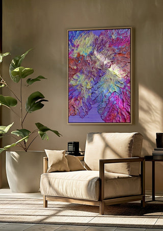 Petal Ridge by Da Winters framed above a beige armchair beside a potted plant