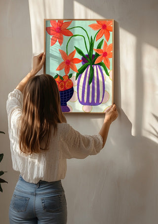 Plums & Peace by LGDyrby being hung on a sunlit wall