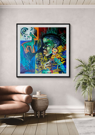Black woman by Ralu in a black frame above a tan leather chair beside a potted plant