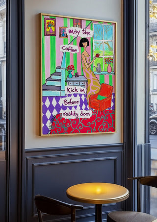 May the Coffee Kick In by Camilla Nilsson in an oak frame on a panelled cafe wall