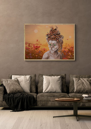 lion woman by Sofia de Lemos in a light wood frame above a grey sofa with cushions