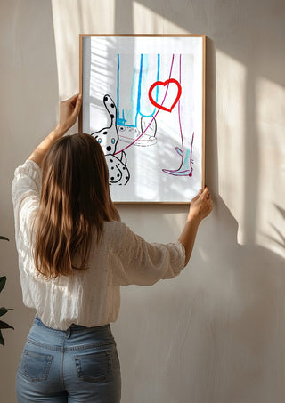 The third wheel by NKo being hung on a sunlit wall