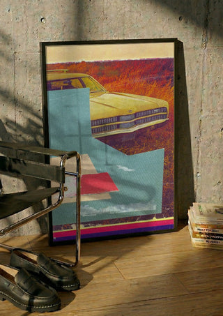 Station Wagon No.4 by Kareem Rizk in a black frame leaning against a concrete wall by a steel chair