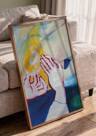 Between the Hands by António D'Albuquerque in a walnut frame leaning against a grey sofa