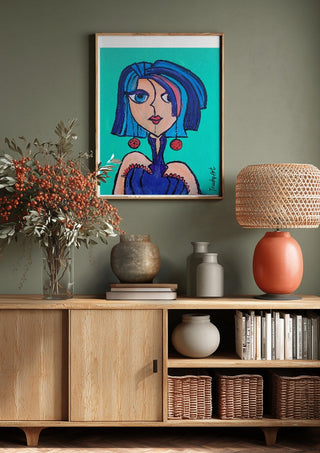 Lady Kontrast by Trude above a wooden sideboard on a sage green wall