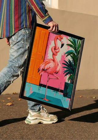Knot today x Flamingo by Decker Studios carried in a black frame along a sunny street