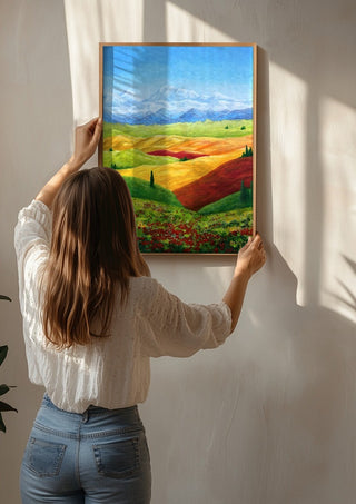 Toscana by Tako being hung on a sunlit wall