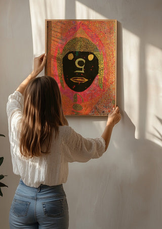 GOA by Ali Kasap being hung on a sunlit wall