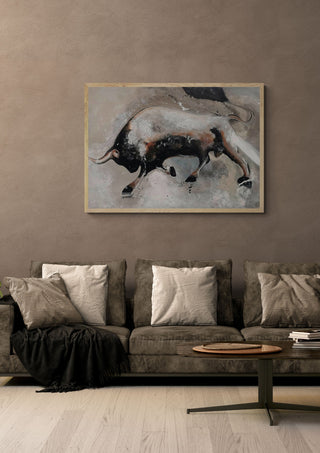 Unleashed by Lüba in a light oak frame above a grey sofa on a warm brown wall