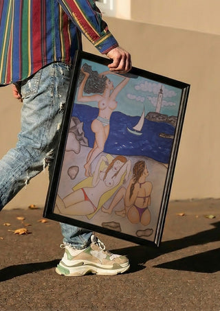 Paraphrasing by KaroGaiaArt carried in a black frame along a sunny street