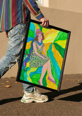 The Lilac Hat by Camilla Nilsson carried in a black frame along a sunny street