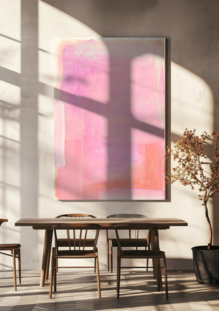 soft atmospheric colorfields by Iris Lehnhardt hanging above a wooden dining table in warm sunlight