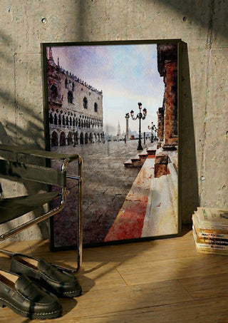 Venezia by Massimo Frascogna in a black frame leaning against a concrete wall by a steel chair