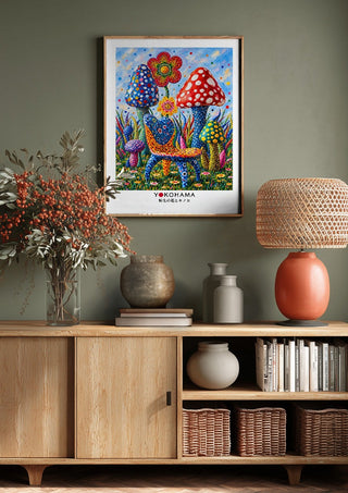 The Dotted Chair by Yokohama above a wooden sideboard on a sage green wall