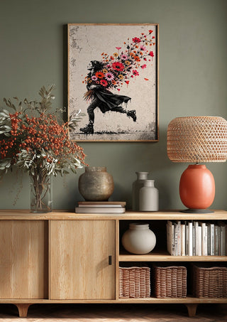Running with Spring by Matthews Gallerie above a wooden sideboard on a sage green wall