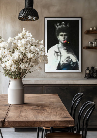 The Midnight Queen by Bent Hardervig in a black frame above a rustic table with white flowers