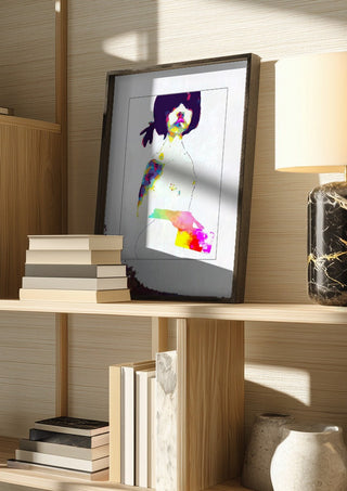 Teenage by Bent Hardervig in a dark frame on a wooden shelf beside books and a lamp