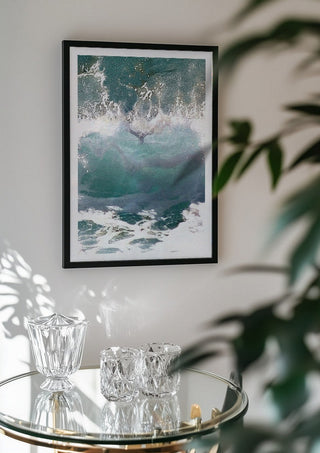 Suddenly Hello by Bent Hardervig in a black frame above a glass table with crystal glassware