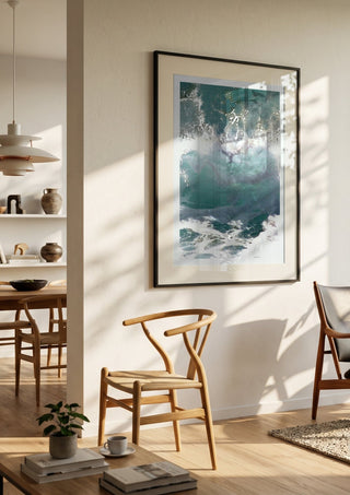 Suddenly Hello by Bent Hardervig in a black frame in a bright dining room with wooden chairs