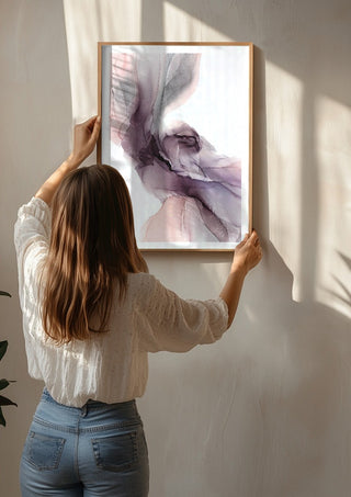 Spring Melody by Anna Dormir being hung on a sunlit wall