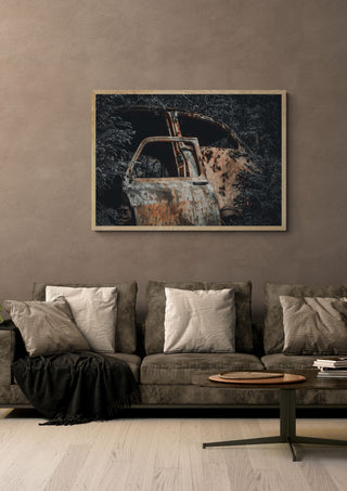 Decay (4) by Lone Gjessing in a light oak frame on a warm grey wall above a brown sofa