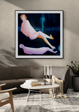 Contact #1 by Luis Valquaresma in a black frame above a grey sofa with a round table and candlesticks